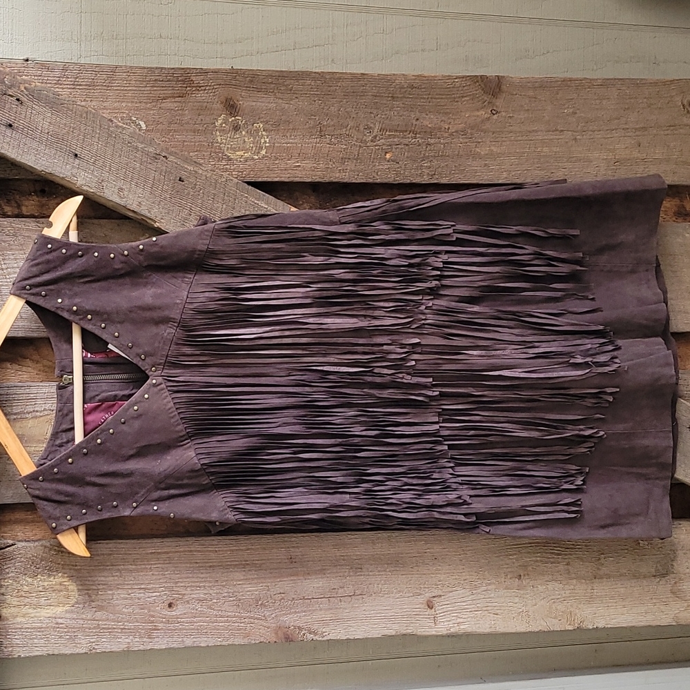 Brand new. Genuine leather Durango fringe dress with back zipper.